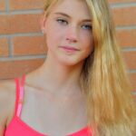 Slim blonde teen Hannah exposes her shaved cunt and ass in public
