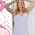 Blonde amateur Veronica displays her naked body while wearing high heels