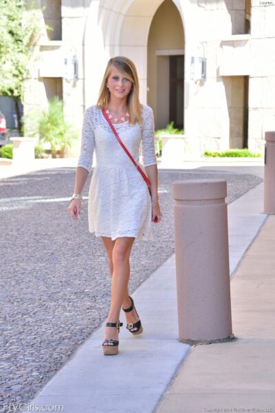 Blonde Lauren strips her dress & teases with her ass with tan lines in public Image #1