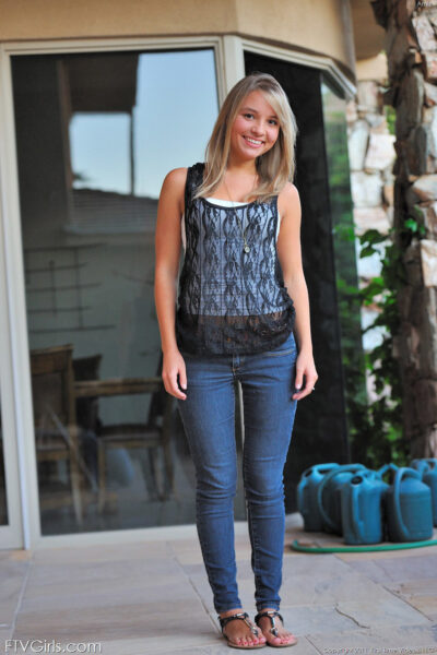 Gorgeous amateur beauty strips her jeans outdoors & spreads her hot teen ass Image #1