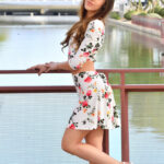 Petite MILF in a cute dress & heels flashing a pantyless upskirt in public
