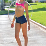 Sweet amateur babe Roxanna exposes her petite body while exercising outdoors