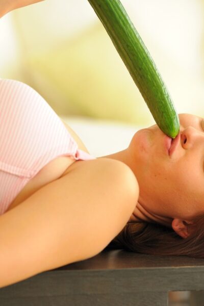 Sweet redheaded babe with big tits Hayden sticks a huge cucumber in her pussy Image #11
