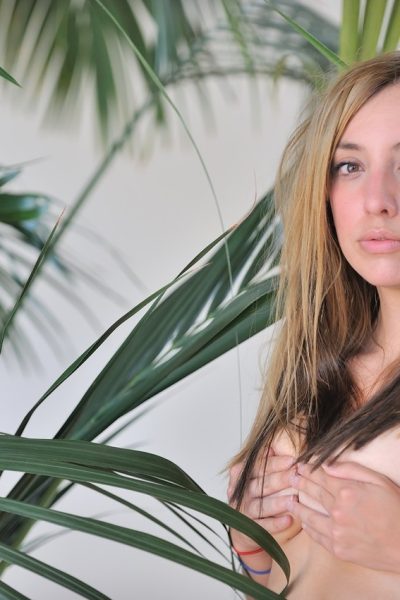 Amateur babe Francis strips down naked and poses in front of a camera Image #19