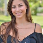 Hot teen shows naked upskirt, strips and toys pussy with eggplant outdoors