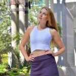 Redhead beauty Cosima gets rid of her panties in public & fists her muff