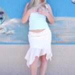 Sweet blonde Alison exposes her big boobs and spreads her hole outdoors