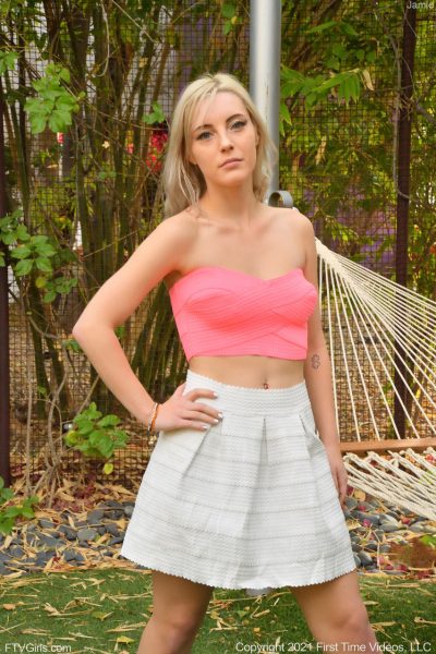 Cute amateur babe Jamie shows her twat and natural titties outdoors Image #5