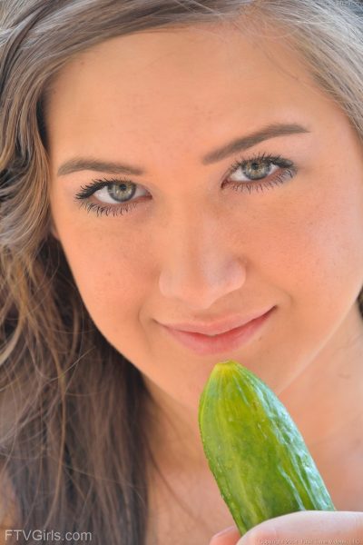 Cute brunette Shannon exposes her twat and slides a cucumber in it in public Image #18