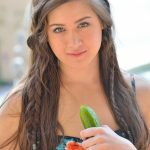 Cute brunette Shannon exposes her twat and slides a cucumber in it in public
