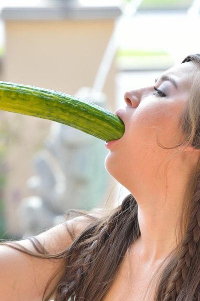 Cute brunette Shannon exposes her twat and slides a cucumber in it in public Image #20