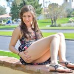 Cute brunette Shannon exposes her twat and slides a cucumber in it in public