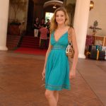 Glamorous babe in a sexy dress Carli flashing an arousing upskirt in public