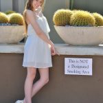 Glamour babe in a sexy sheer dress Eva giving a pantyless upskirt in public