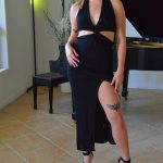 Sexy blonde Jill masturbates with a white dildo while sitting at the piano