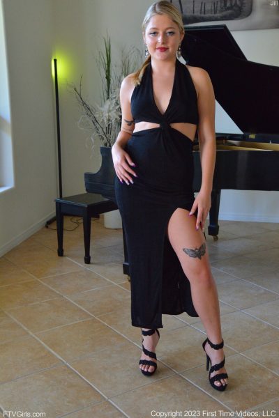 Sexy blonde Jill masturbates with a white dildo while sitting at the piano Image #6
