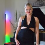 Sexy blonde Jill masturbates with a white dildo while sitting at the piano