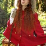 Tiny redhead teen Dolly enjoys solo masturbation with bananas in the forest
