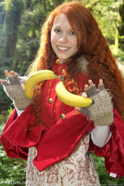 tiny redhead teen dolly enjoys solo masturbation with bananas in the forest 16