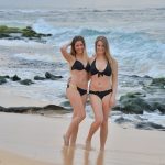 Two ravishing sex bombs enjoy spreading their cunt at the beach
