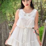 Alluring babe Vanna shows her beautiful tits & her trimmed pussy in public