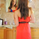 Babe in a red dress Lola flashes her cunt downtown before masturbating at home