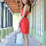 Babe in a red dress Lola flashes her cunt downtown before masturbating at home