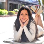 Dark-haired amateur April flashes in public with no panties on