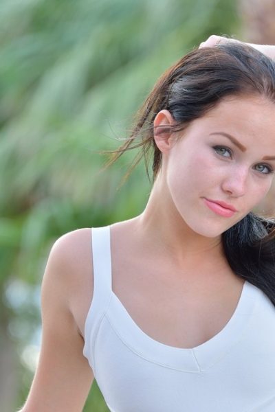 Lovely raven-haired babe spreads her pussy lips in a public place Image #12