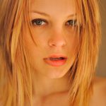 Young blonde Brea shows off her big booty and sits on her big dildo