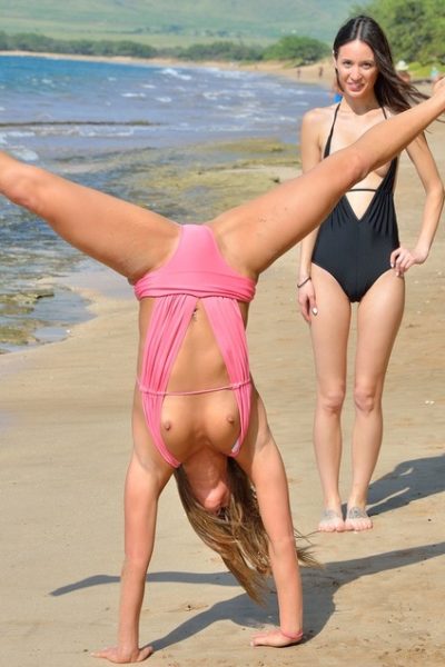 2 lesbians frolic in swimsuits at the beach before strolling in the nude 2 lesbians frolic in swimsuits at the beach before strolling in the nude Image #12