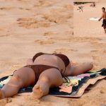 Sexy bikini model Carli removes her top & shows her natural boobs at the beach